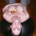 Telephone receiver from a tiny man with giantess shadow suggesting a bbw phonesex call
